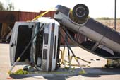 Two cars being stabilized with Genesis Kodiak Strut System