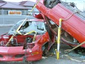 Cars being stabilized with Res-Q-Jacks